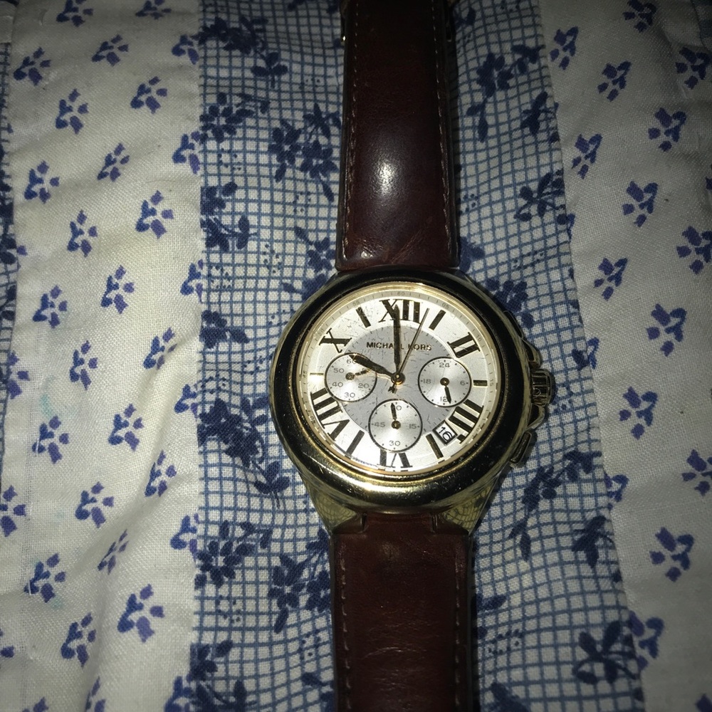 Mk men’s gold watch